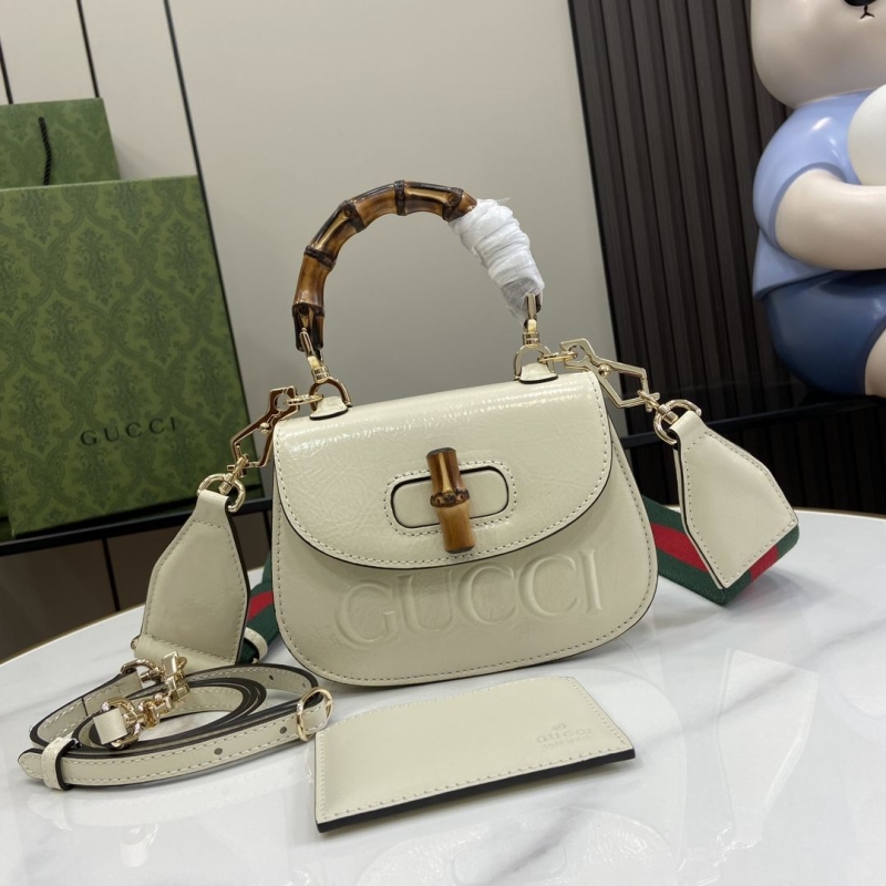 G*u*i top handle bags